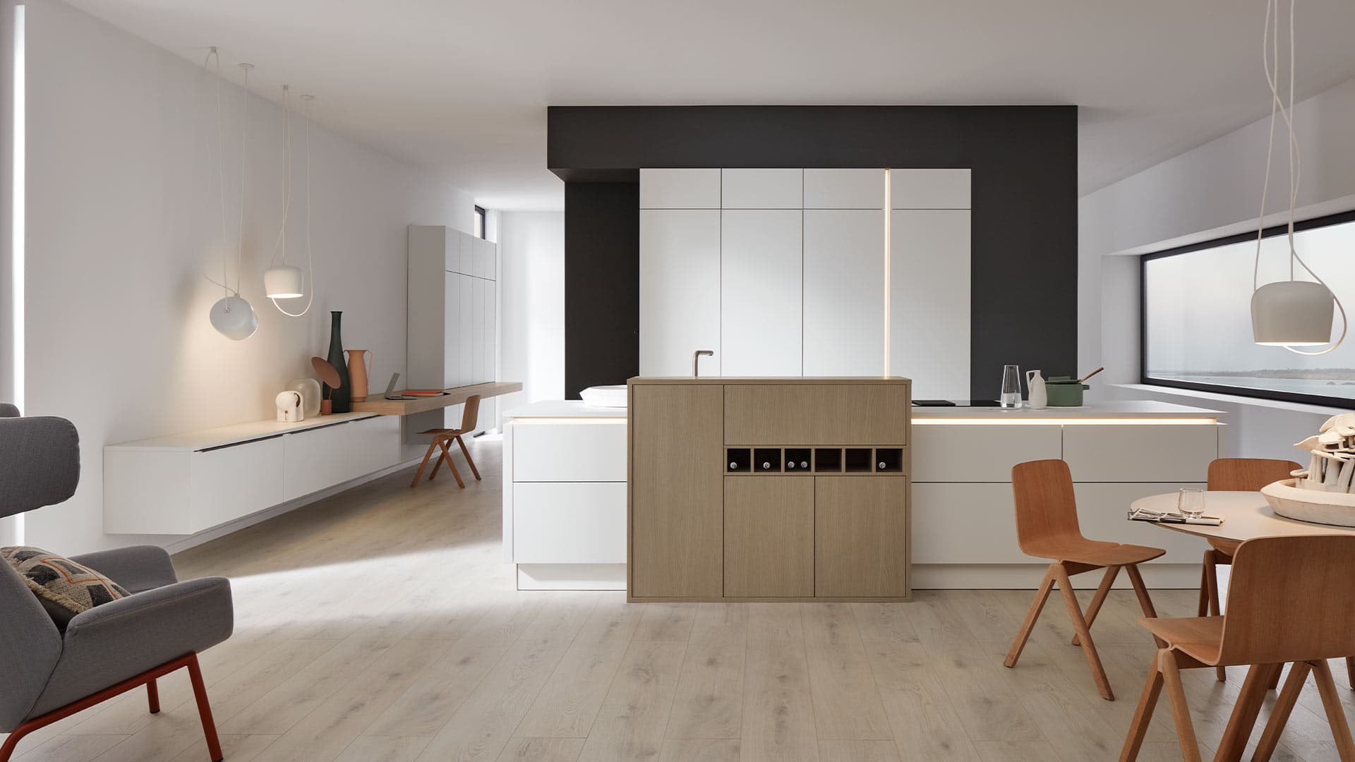 Eine weiße, moderne Küche steht auf einem hellen Holzboden. Im Mittelpunkt steht die holzfarbene neoBox von nolteneo.